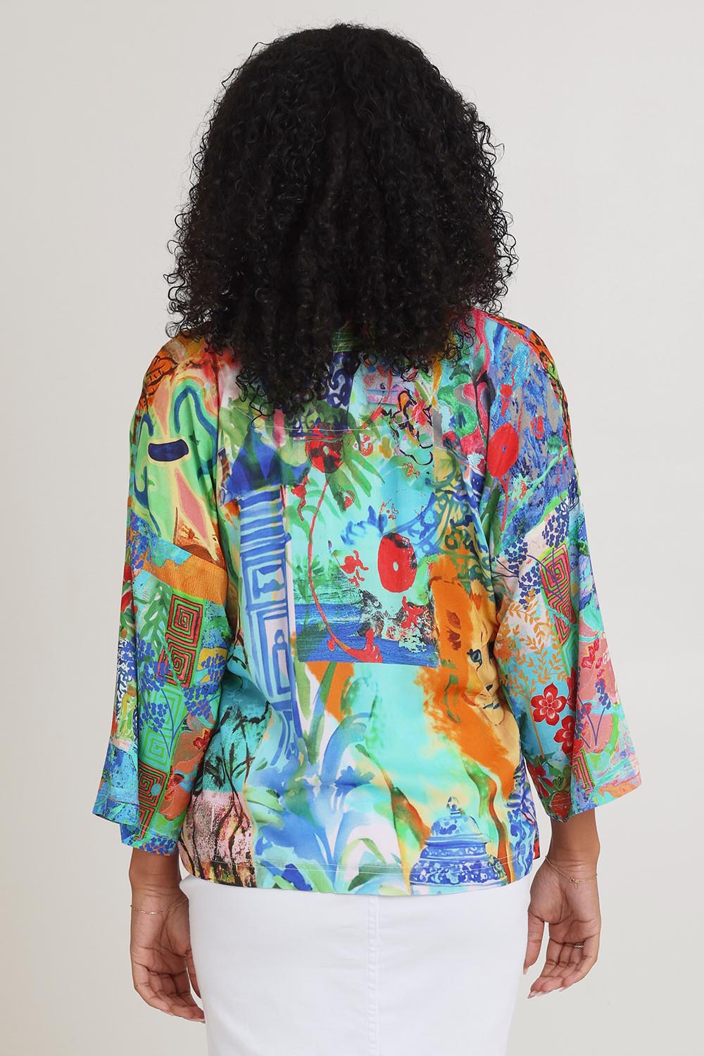 Model Ziara wearing size 10 of the Digital Kimono in colour Oriental, from the back