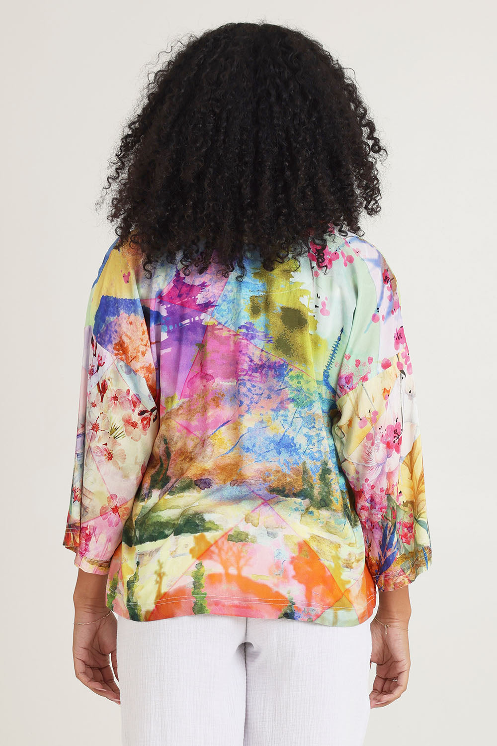 Model Ziara wearing size 10 of the Digital Kimono in colour Scenic, from the back