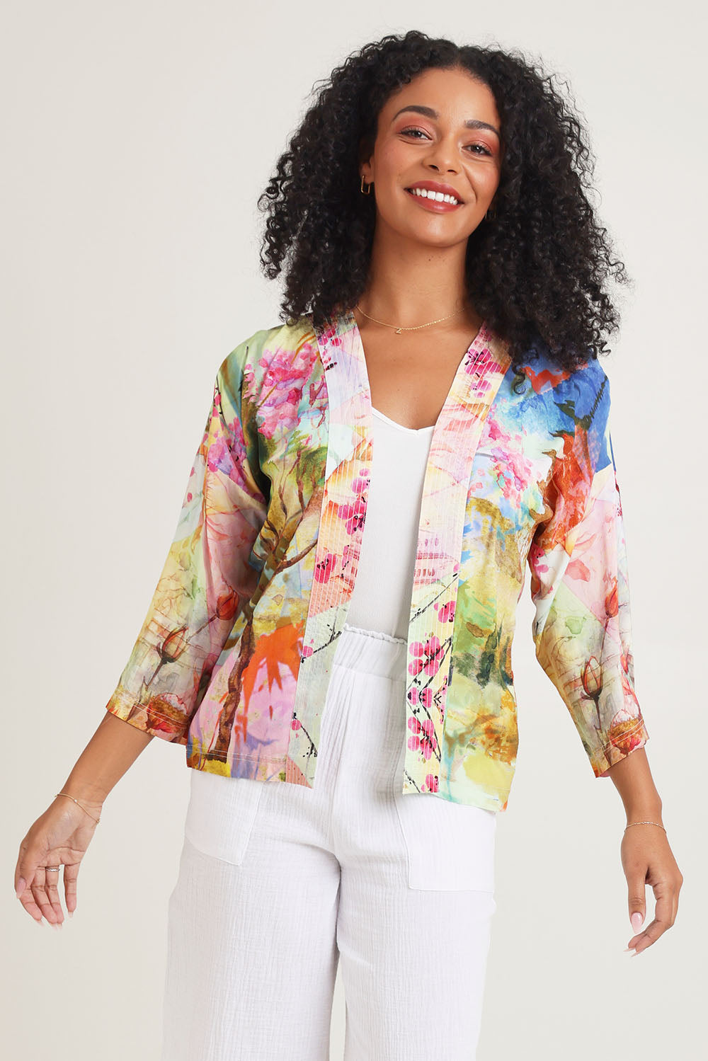 Model Ziara wearing size 10 of the Digital Kimono in colour Scenic, from the front, cropped image