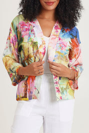 Model Ziara wearing size 10 of the Digital Kimono in colour Scenic, from the front, cropped image