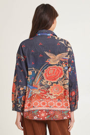 Model Madeline wearing size 10 of the Cord Shirt in colour Embroidery (Blue), from the back