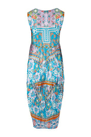 Product shot of the Iruya Organic Cotton Bubble Dress in colour Blue (Blue), from the back