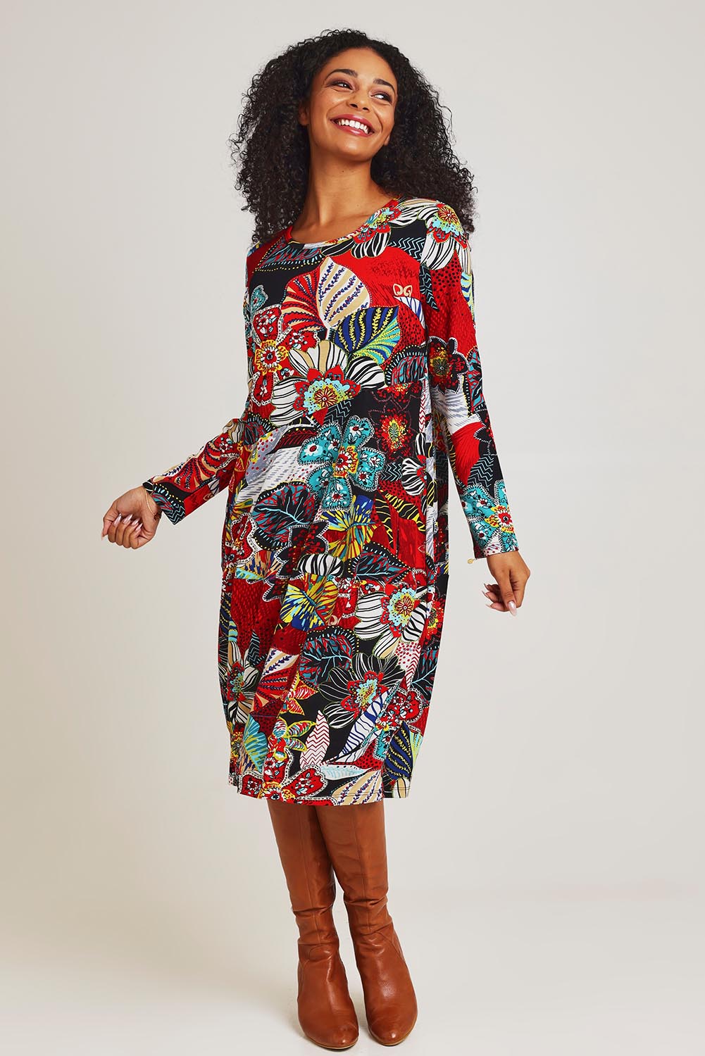 Model Ziara wearing size 10 of the Staying Alive Panel Bubble Dress in colour Alive (Red), from the front, showing the whole outfit