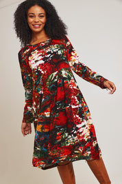 Model Ziara wearing size 10 of the Freebird Bubble Dress in colour Freebird, from the front, cropped image