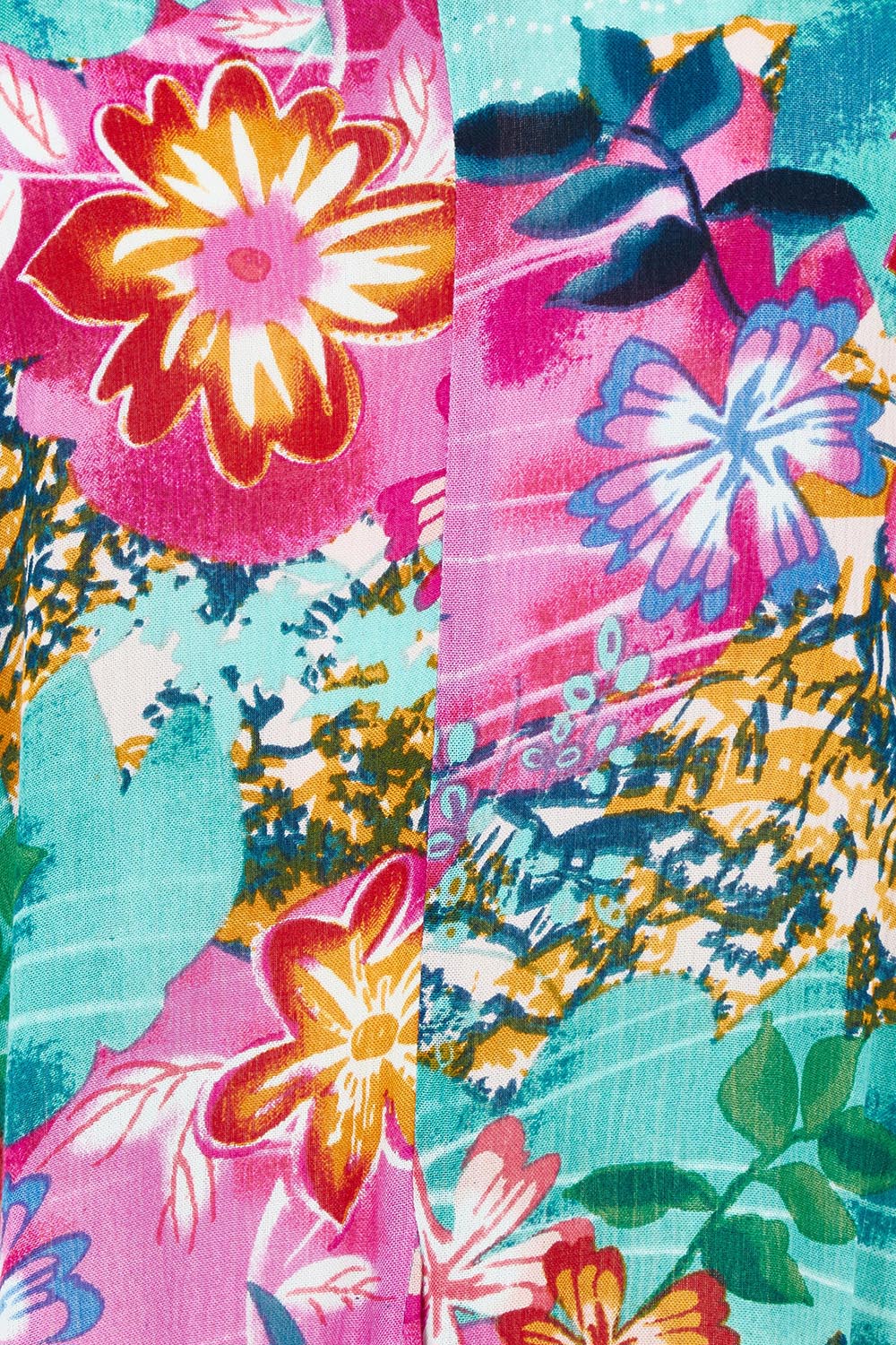 Product shot of the Short Sleeve Godet Dress in colour Selaron, detail