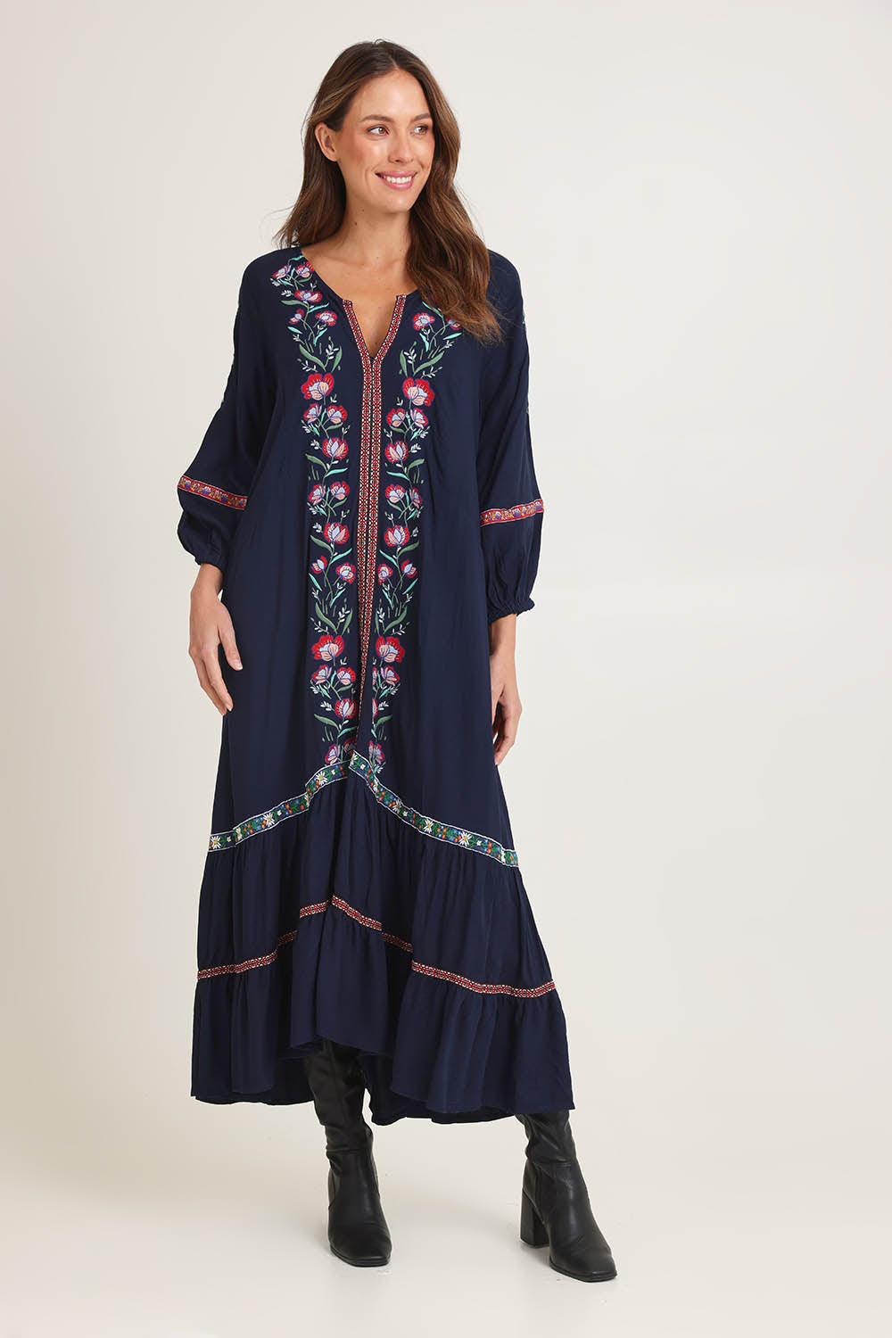 Model Madeline wearing size 10 of the Embroidered Maxi Dress in colour Ivanova (Blue), from the front, showing the whole outfit