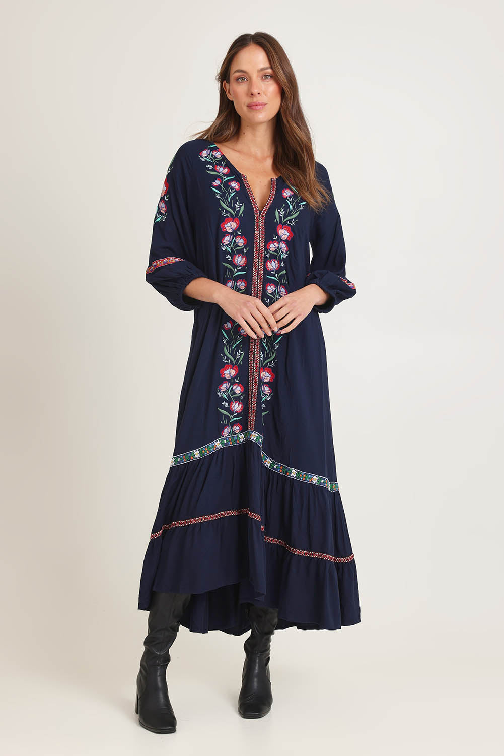Model Madeline wearing size 10 of the Embroidered Maxi Dress in colour Ivanova (Blue), from the front, showing the whole outfit
