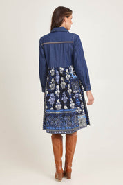 Model Madeline wearing size 10 of the Denim Mix Dress in colour Bhadoi (Blue), from the back