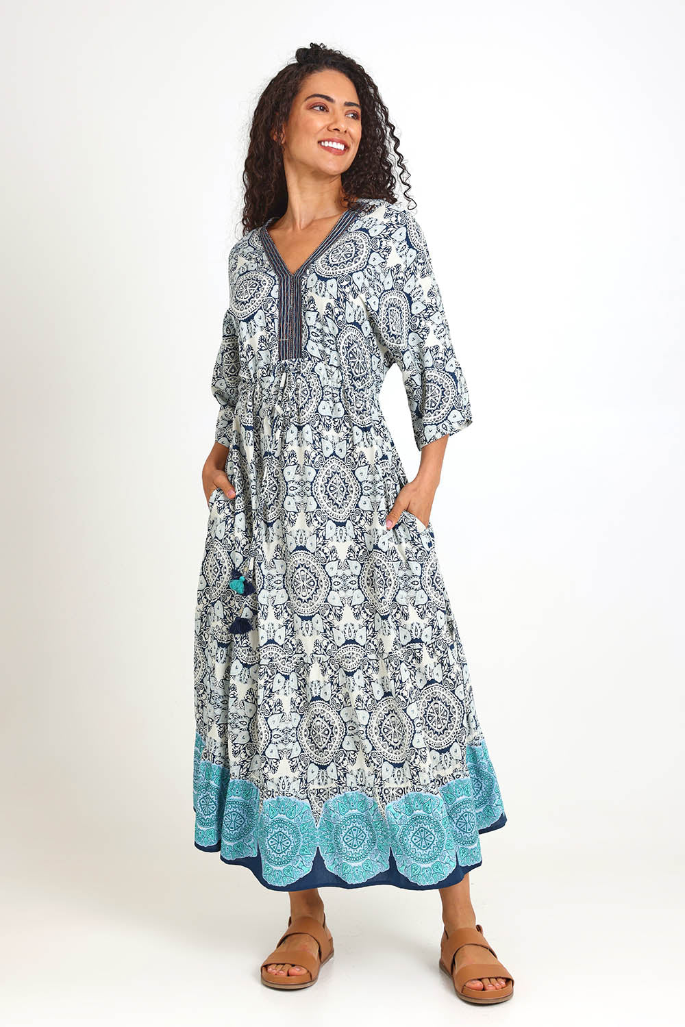 Model Pamelar wearing size 10 of the V Maxi Dress – Print in colour Print, from the front
