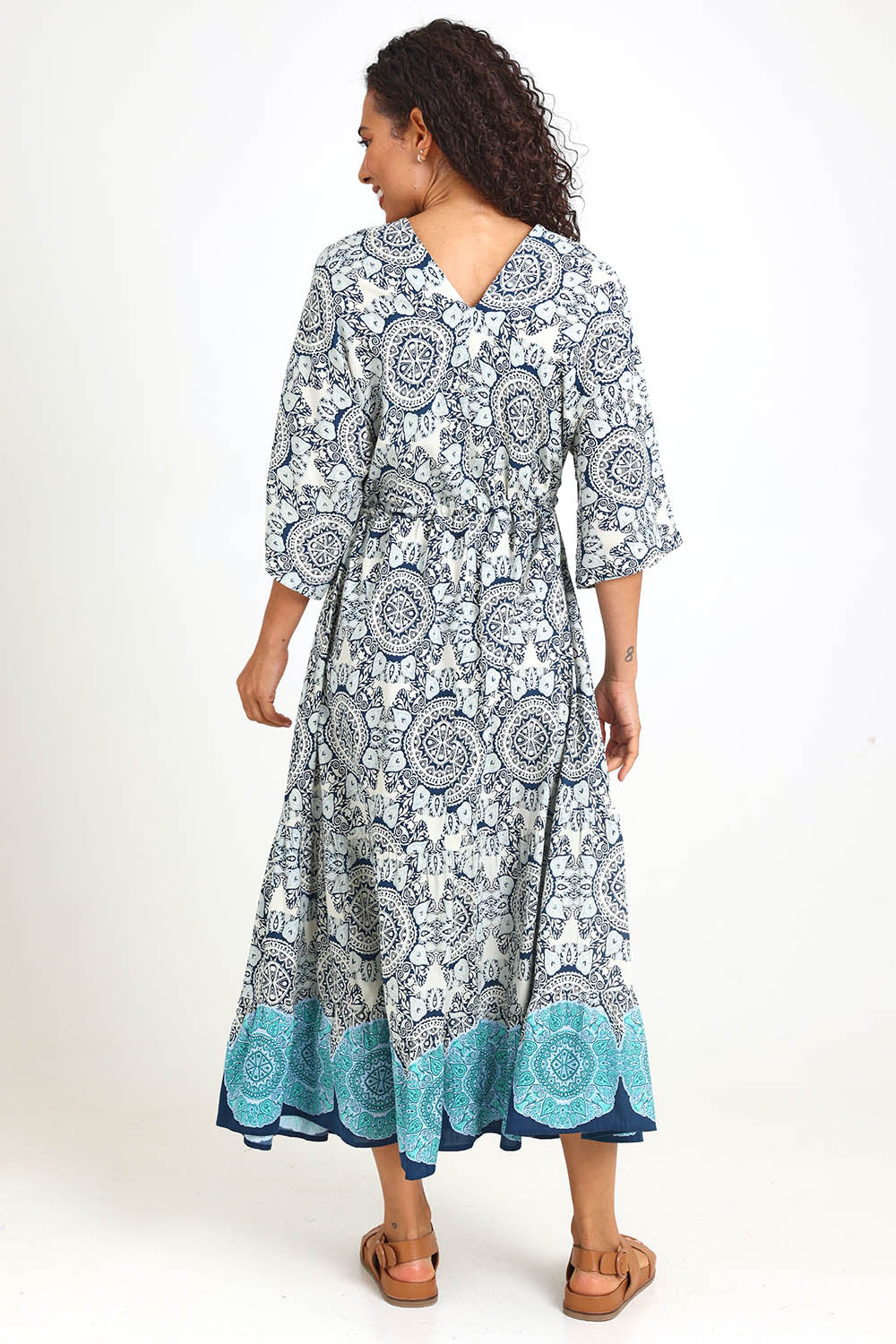 Model Pamelar wearing size 10 of the V Maxi Dress – Print in colour Print, from the front
