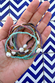 Product shot of the Luna Pearl Bracelet - Pearl in colour Pearl, from the front