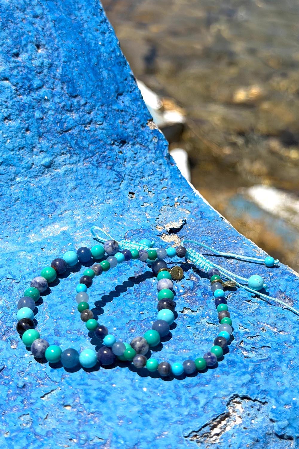 Product shot of the Spirit Stones Medium Bead Bracelet - Turquoise in colour Turquoise, from the front