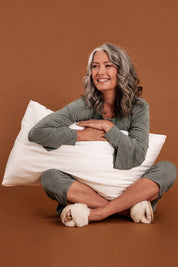 A model wearing size OneSize of the Audrey Boxed Silk Pillow Slip in colour White (White), from the front, showing the whole outfit