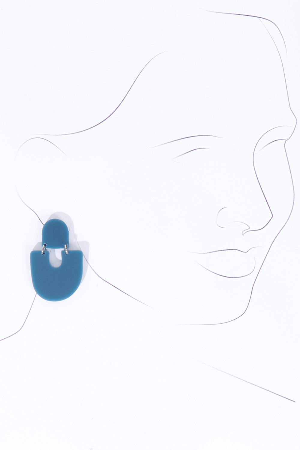 A model wearing the Moops Block Drop Earring in colour Navy (Blue), from the front, showing the whole outfit