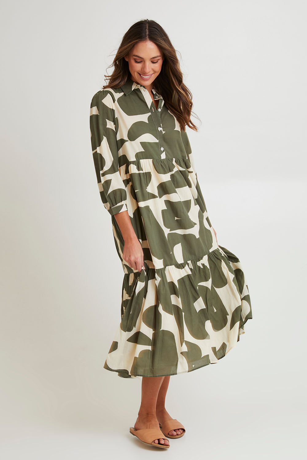 Model Madeline wearing size S of the Cotton Shirt Dress in colour Khakikool (Green), from the front, showing the whole outfit