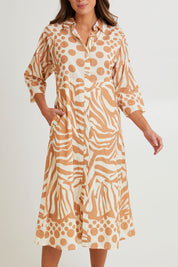 Model Madeline wearing size S of the Cotton Shirt Dress in colour Print, from the front, cropped image