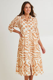 Model Madeline wearing size S of the Cotton Shirt Dress in colour Print, from the front, cropped image