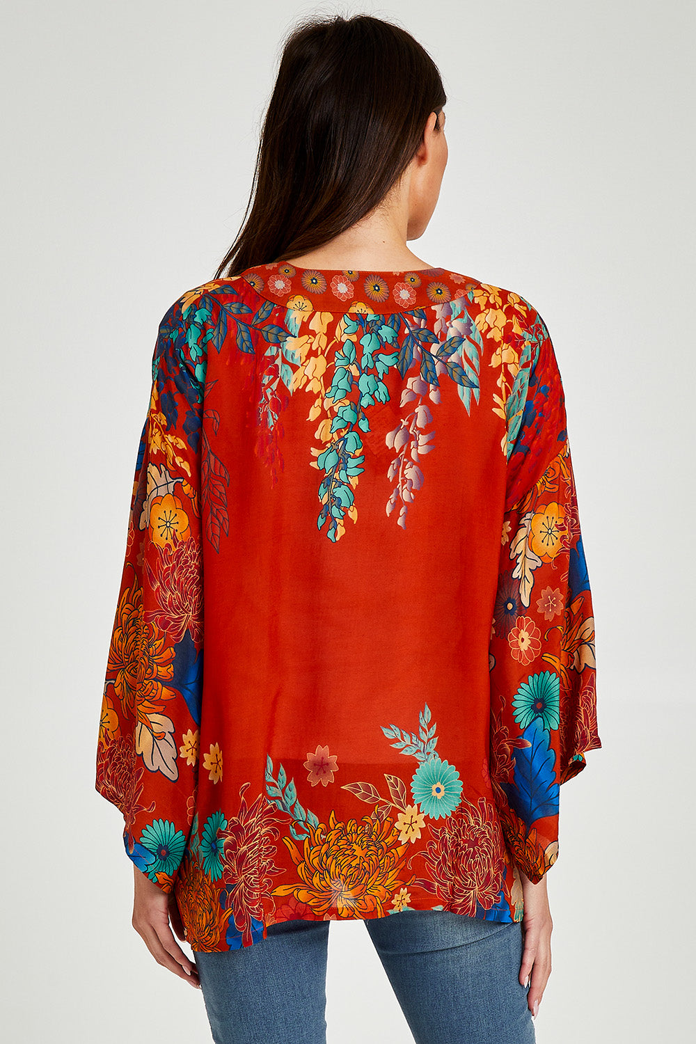Model Madeline wearing size OneSize of the Kimono Jacket in colour Terracotta, from the back