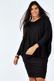 Model Shanaya wearing size L of the Ruche Skirt in colour Black (Black), from the front, cropped image