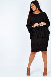 Model Shanaya wearing size L of the Ruche Skirt in colour Black (Black), from the front, showing the whole outfit