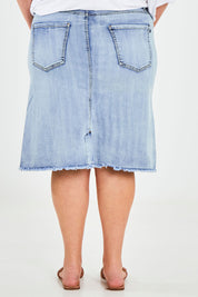Model Caitlin wearing the Frayed Denim Skirt in colour Lightdenim (Blue), from the back