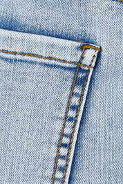 Product shot of the Frayed Denim Skirt in colour Lightdenim (Blue), detail