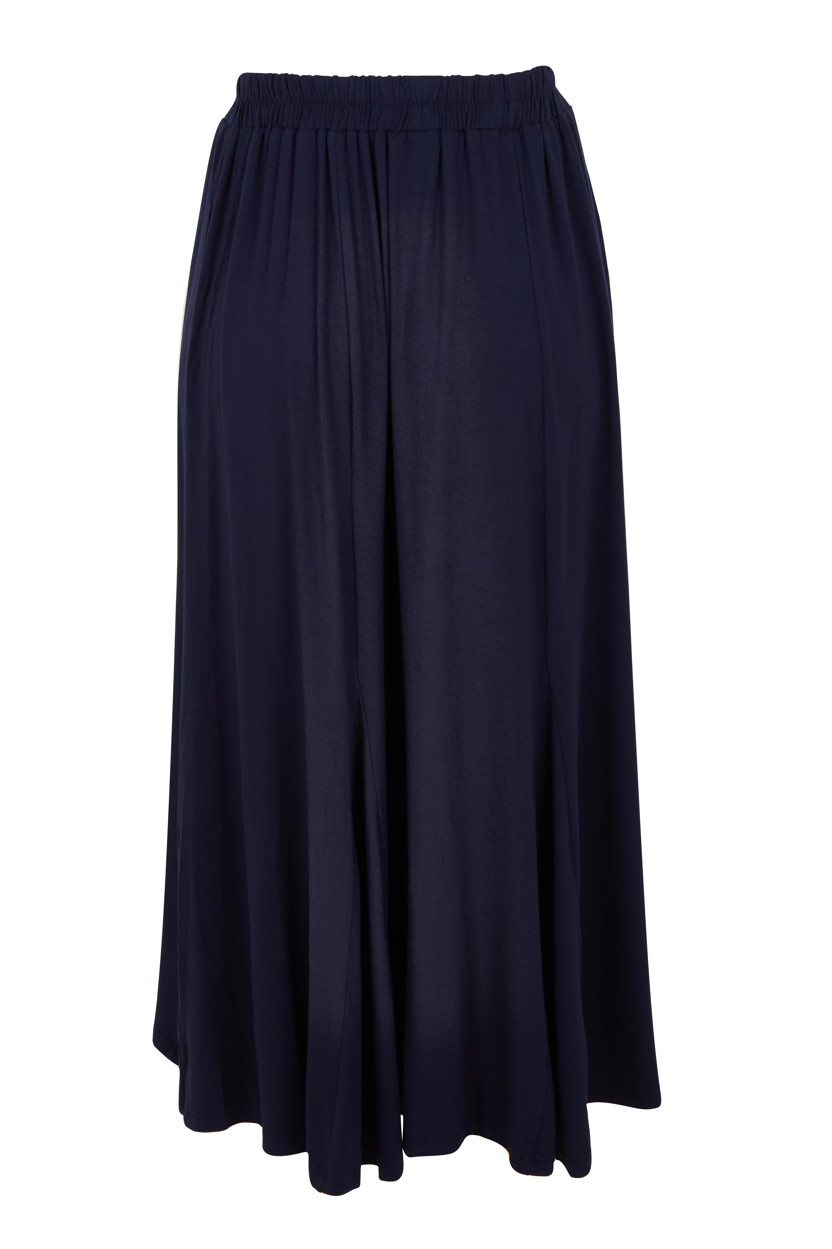 Product shot of the Adeline Bamboo Skirt in colour Navy (Blue), from the back