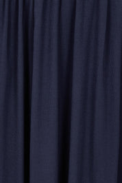 Product shot of the Adeline Bamboo Skirt in colour Navy (Blue), detail