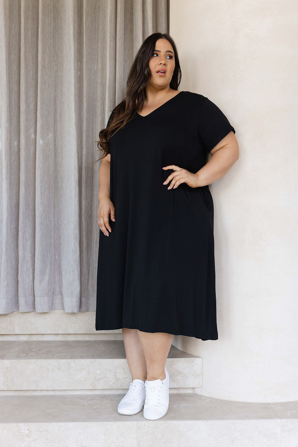 A model wearing the Tin colourShirt Dress - Black (Black), from the front, showing the whole outfit