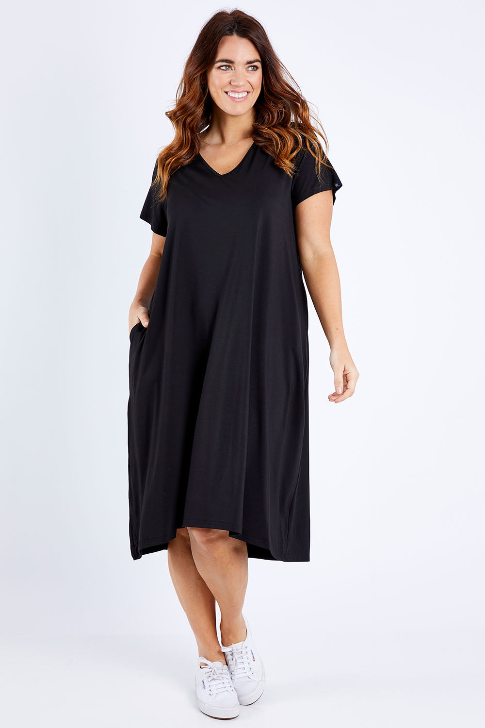 Model Laura wearing the Tin colourShirt Dress - Black (Black), from the front, showing the whole outfit