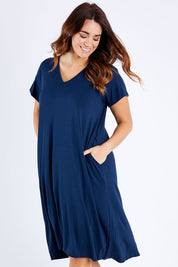 Model Laura wearing the Tin colourShirt Dress - Navy (Blue), from the front, cropped image