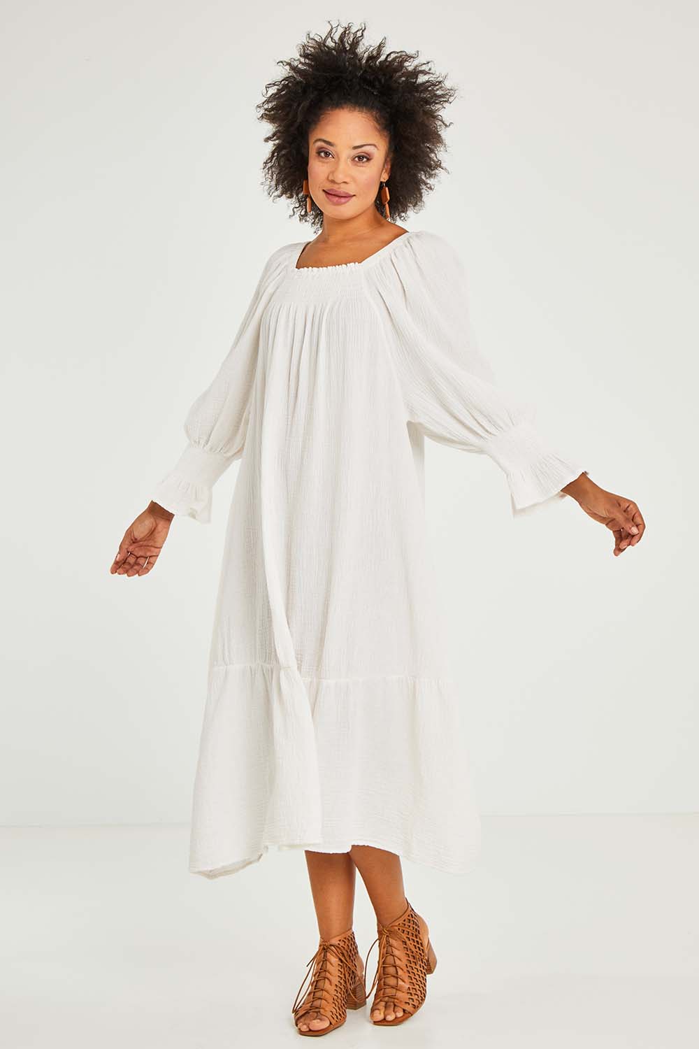 Model Olivia wearing the Ashbury Cotton Dress in colour Sakurwhite (White), from the front, showing the whole outfit