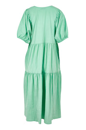 Product shot of the Roamer Tencel Blend Dress in colour Caribbean (Green), from the back