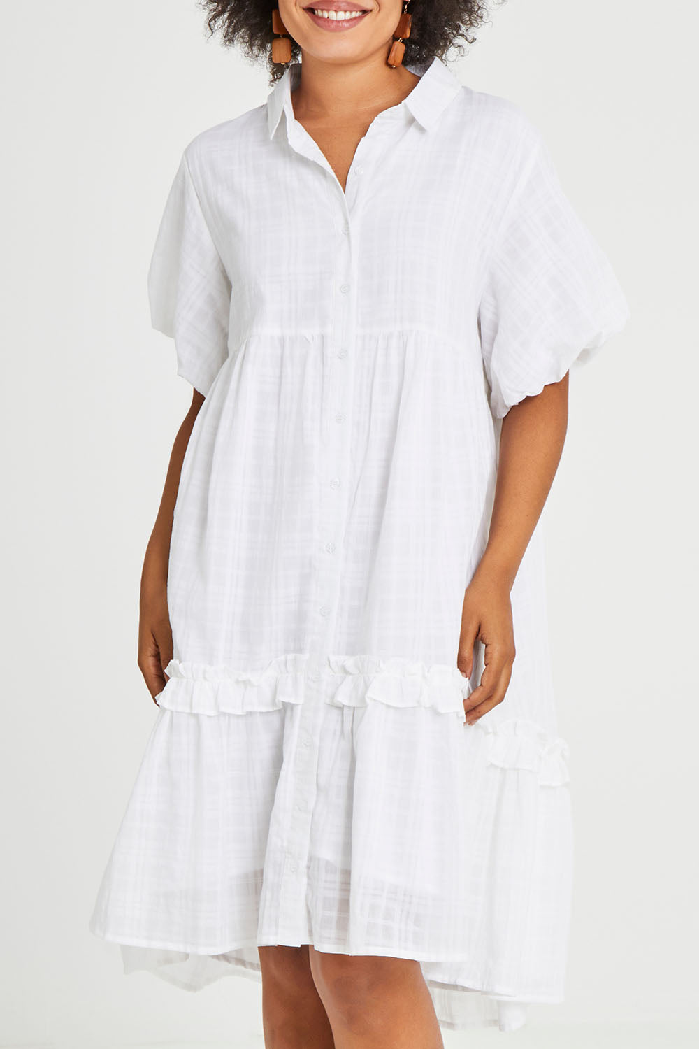 Model Olivia wearing the Petra Cotton Dress in colour White (White), from the front, cropped image