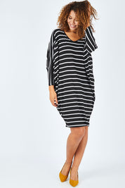 Model Summer wearing size OneSize of the Long Sleeve Stripe Miracle Dress in colour BlackWhite (Black), from the front, showing the whole outfit