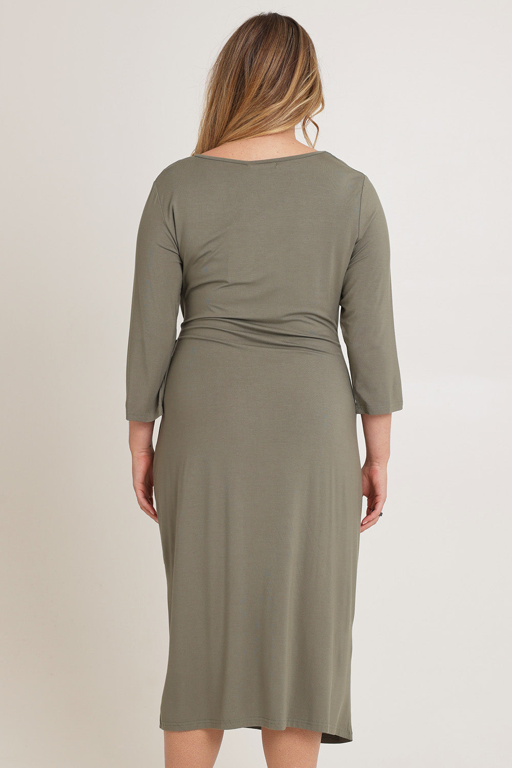 Model Chanel wearing size XL of the Mallory Bamboo Dress in colour Fern (Green), from the back