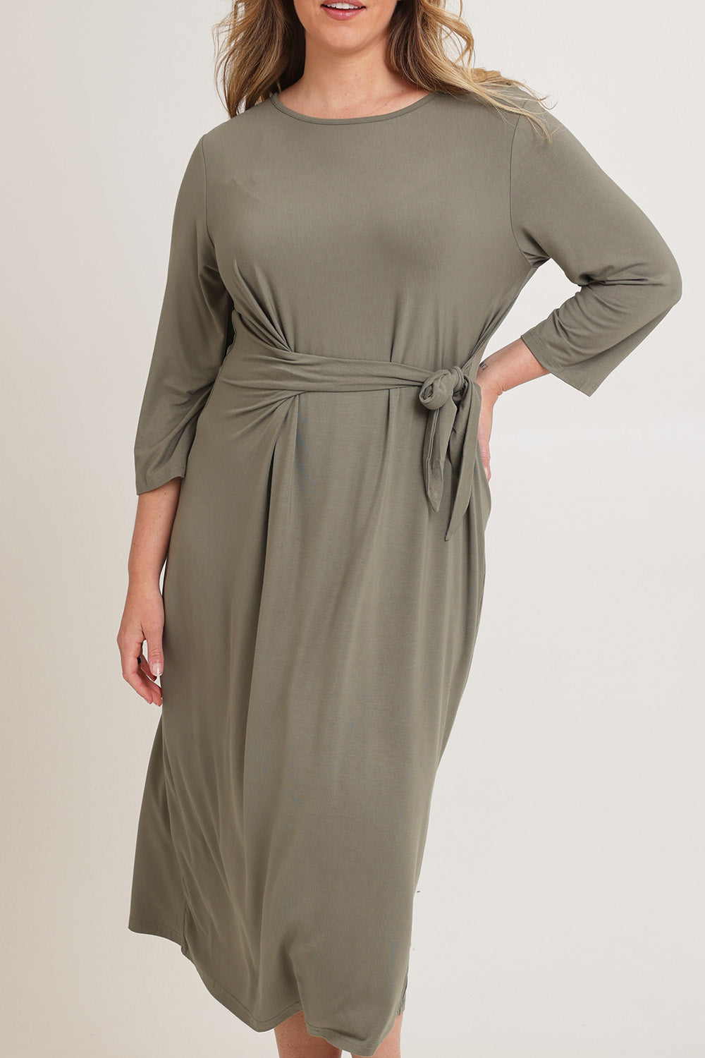 Model Chanel wearing size XL of the Mallory Bamboo Dress in colour Fern (Green), from the front, cropped image