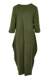 Product shot of the Alviva Lounge Dress in colour Fern (Green), from the back