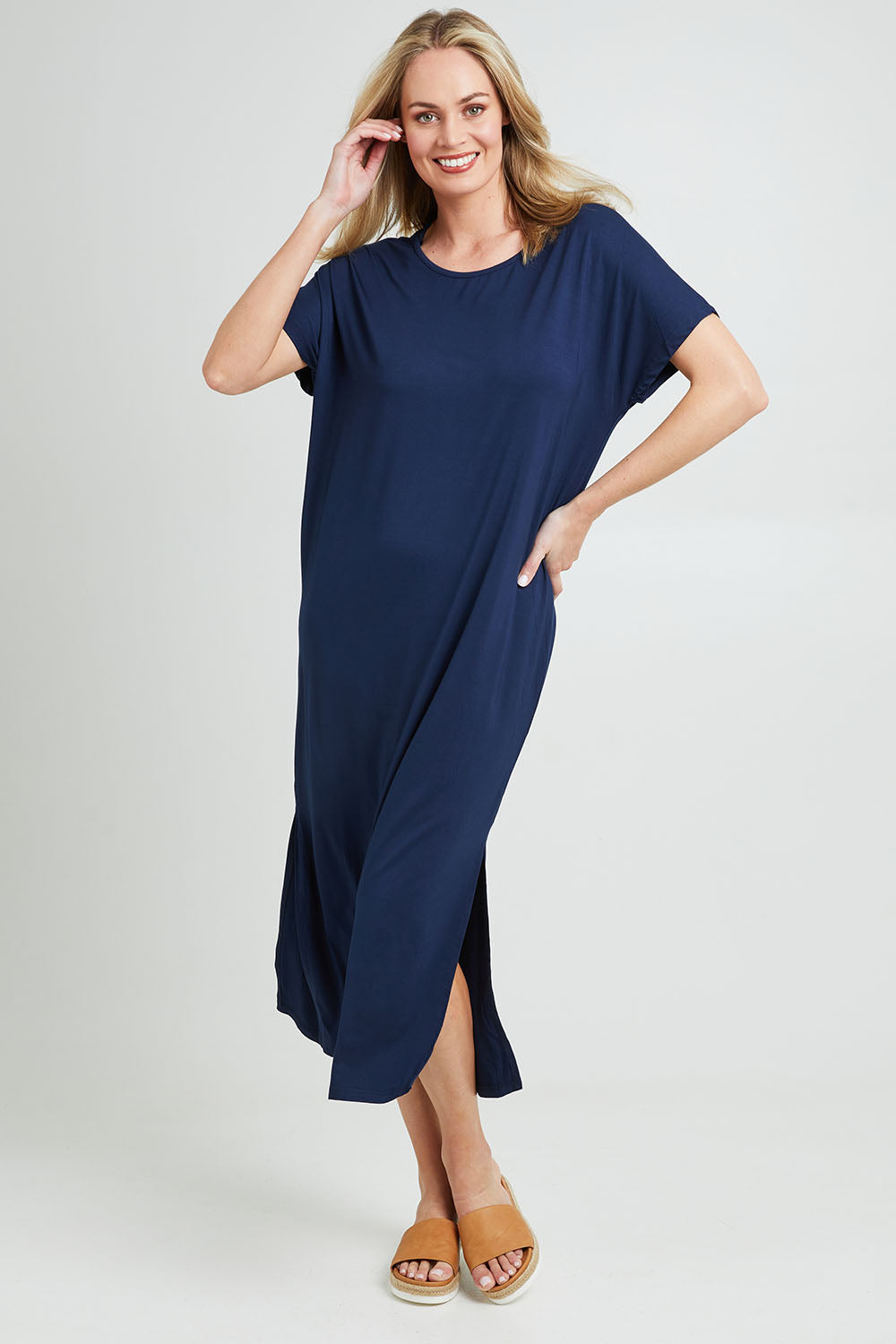 Model Grace wearing the Destiny Round Neck Dress in colour Navy (Blue), from the front, showing the whole outfit