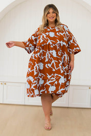 A model wearing the Kingsley Cotton Dress in colour Myrtle, from the front, showing the whole outfit