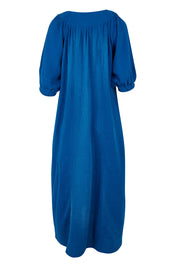 Product shot of the Novella Cotton Dress in colour Ultramarin (Blue), from the back