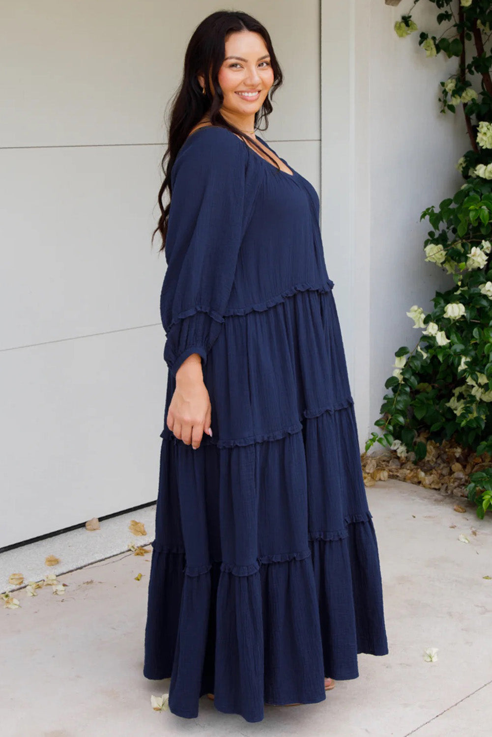 A model wearing the Lottie Midi Cotton Dress in colour Deepsea (Blue), from the front, showing the whole outfit