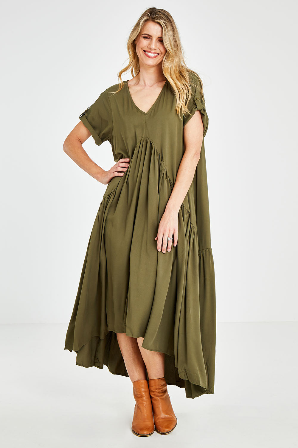 Model Kelly wearing the Short Sleeve Peak Maxi Dress in colour Khaki (Green), from the front, showing the whole outfit