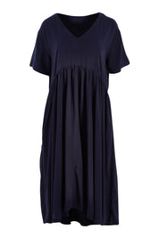 Product shot of the Wander Dress in colour Navy (Blue), from the front