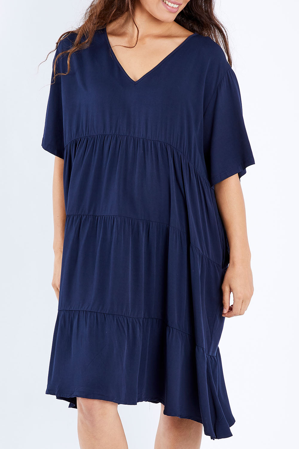 Model Larissa wearing the Chic Dress in colour Navy (Blue), from the front, cropped image