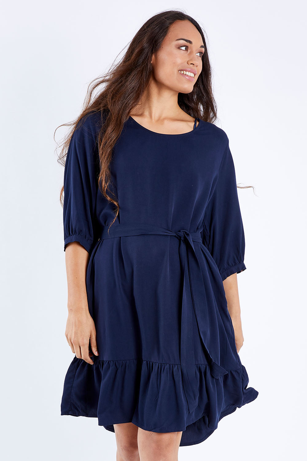 Model Larissa wearing the Flare Dress in colour Navy (Blue), from the front, cropped image