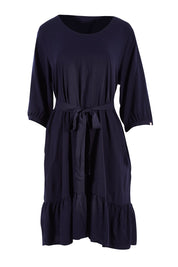 Product shot of the Flare Dress in colour Navy (Blue), from the front