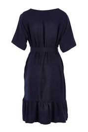 Product shot of the Short Sleeve Flare Dress in colour Navy (Blue), from the back