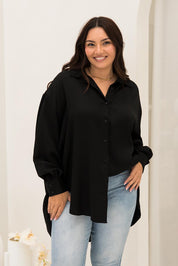 A model wearing the Amore Tencel Shirt in colour Black (Black), from the front, showing the whole outfit
