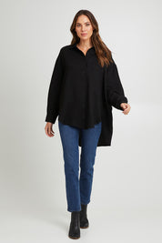 Model Madeline wearing the Amore Tencel Shirt in colour Black (Black), from the front, showing the whole outfit